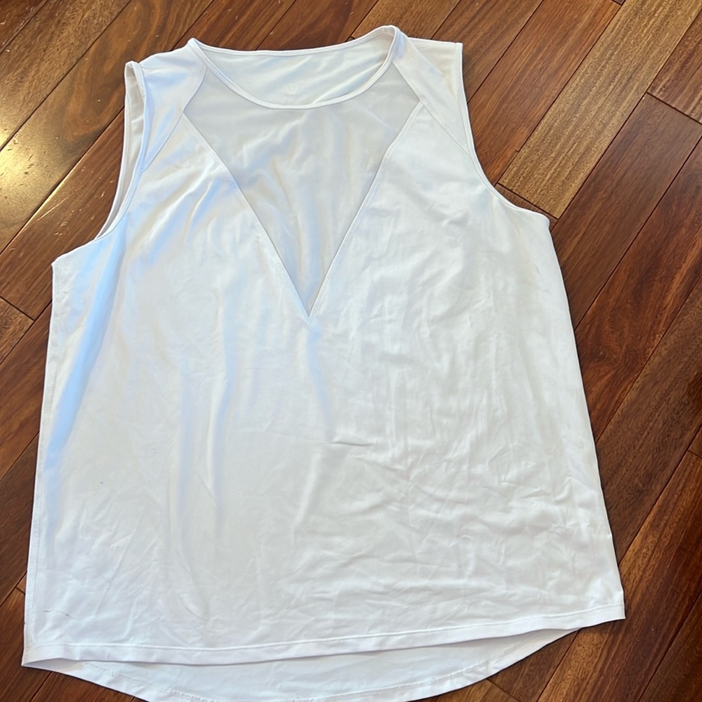 Baby pink lululemon tank with mesh front cut v.